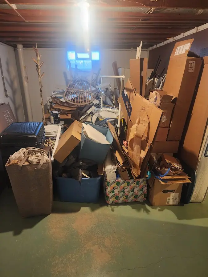 Roll-off dumpster container at job site for 15 Yard Dumpster Rental in Sunset